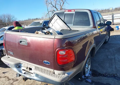 2001 Ford F150 Supercrew z USA, uszkodzony, nr VIN 1FTRW07L41KB97332